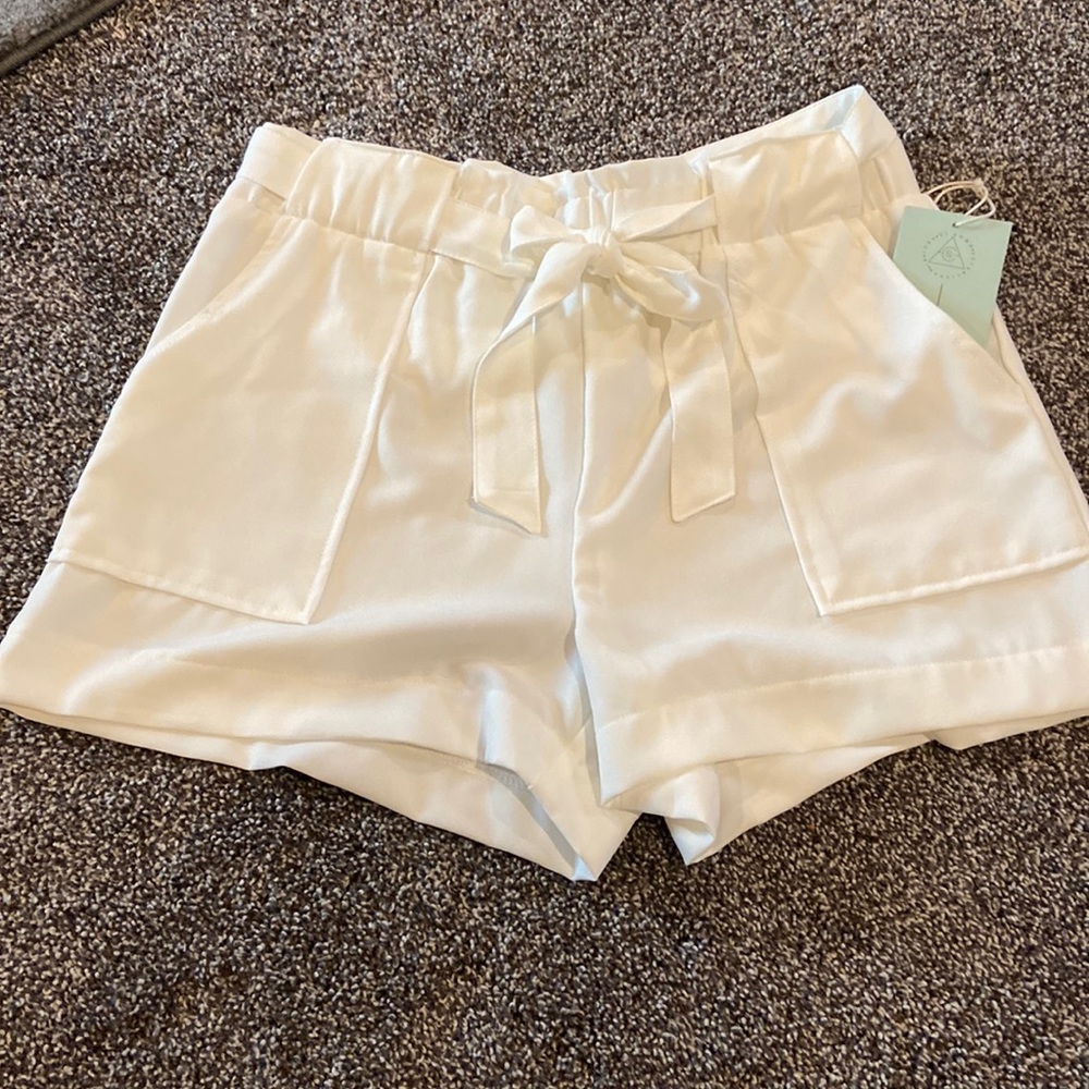 Brand NEW with tags. Dressy shorts, SZ Medium